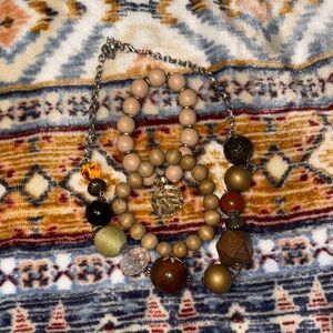 Elegant Beaded Necklace with Gold and Brown Accents